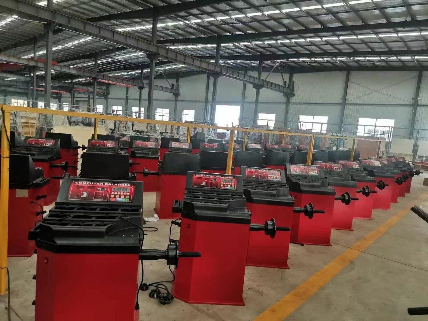 Wheel balancer assembly line